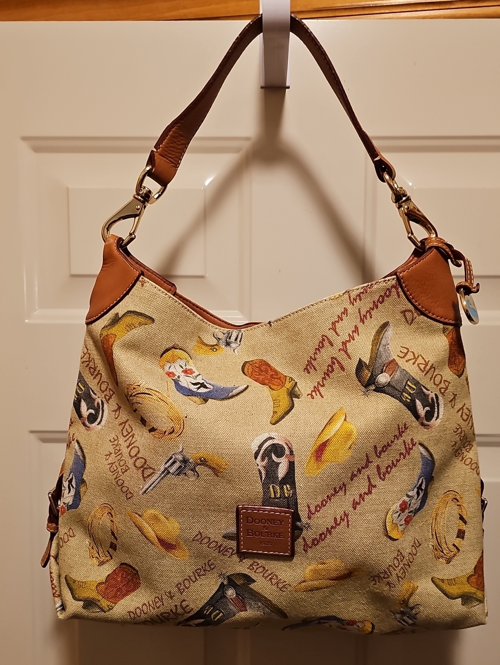 Dooney & Bourke Beige Canvas Western Print Hobo with Brown Leather Trim